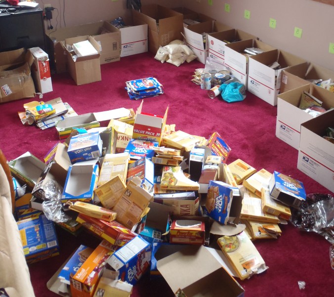 The aftermath of putting 450 Powerbars, 300 poptarts and many more into individual boxes