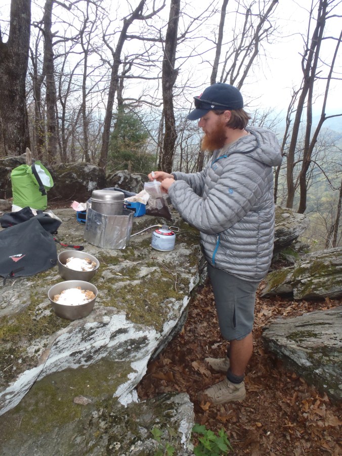 Close up of Clay cooking some breakfast while still in Georgia.