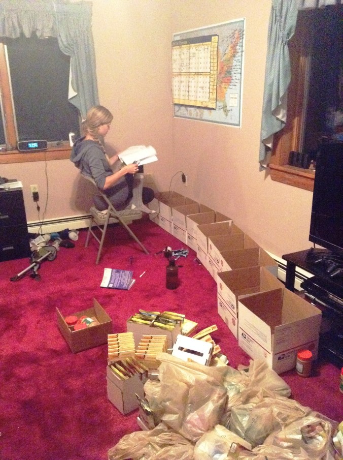 Lindsay studying the mileage books and plotting mail drops