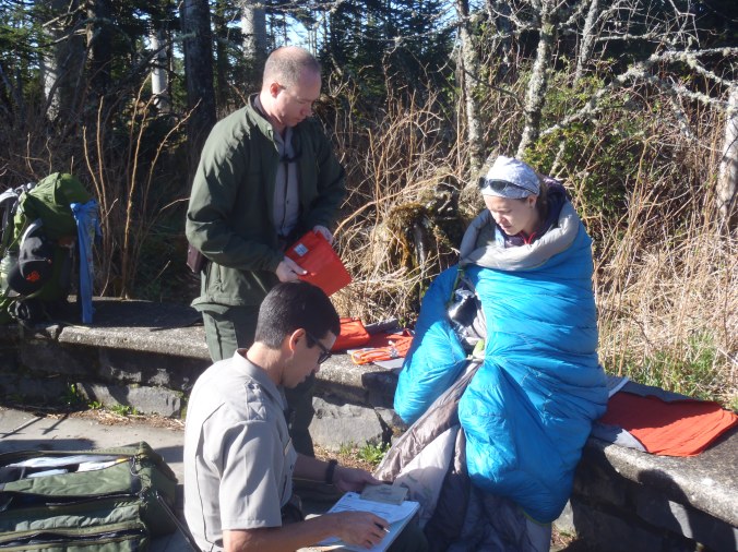 Lindsay getting checked out by the Park Rangers waiting for the ambulance.