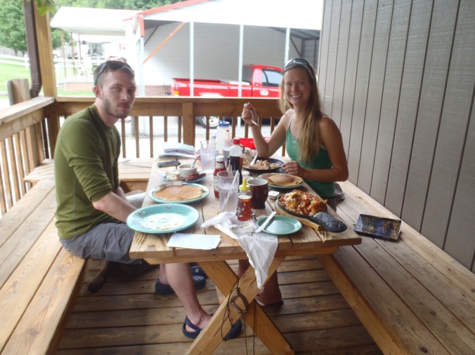 Lindsay and George, our new hiking buddy, eating breakfast in Hot Springs
