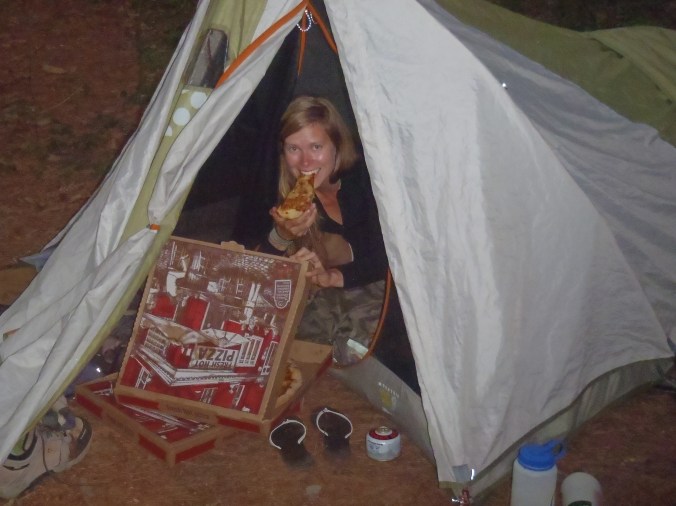 Lindsay eating some delicious pizza while still on the trail. Hooray!