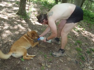 Clay, being a good parent and giving water to the trail princess.