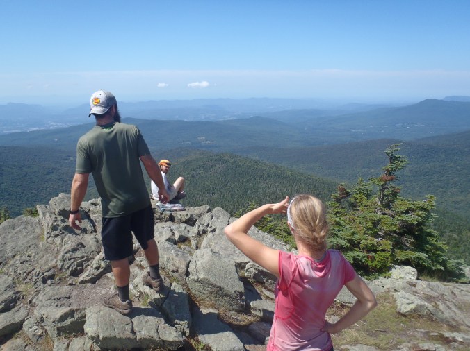 Lindsay and Bullfrog looking toward the White Mountains of New Hampshire from Killington Peak