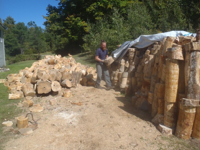 Clay stacking wood while Lindsay took photos... good thing SOMEONE was working for stay!