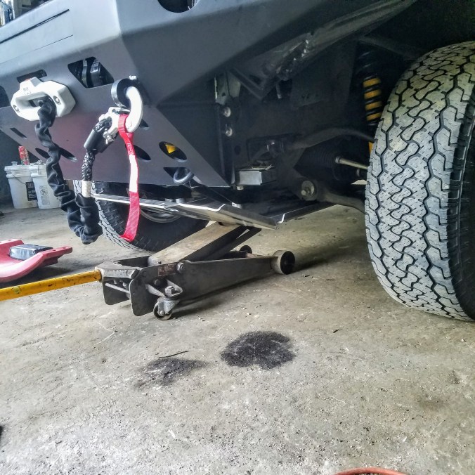 expedition overland truck build skid plate installation