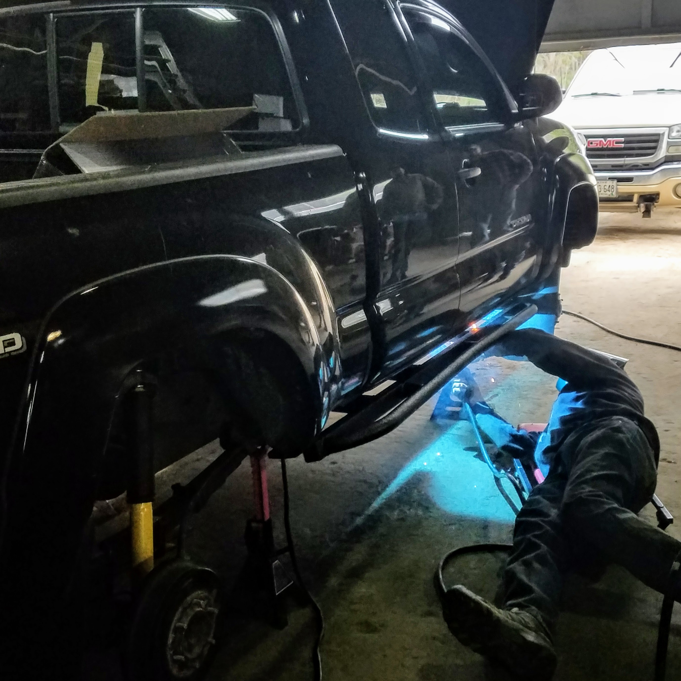 expedition overland truck build rock slider installation
